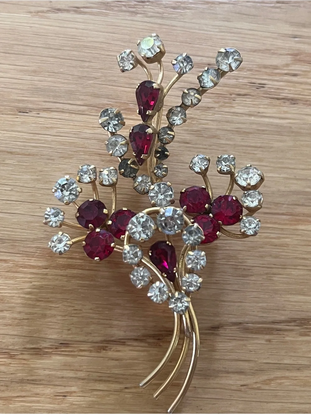 Vintage Gold-Tone Floral Brooch with Ruby Red and Clear Rhinestones